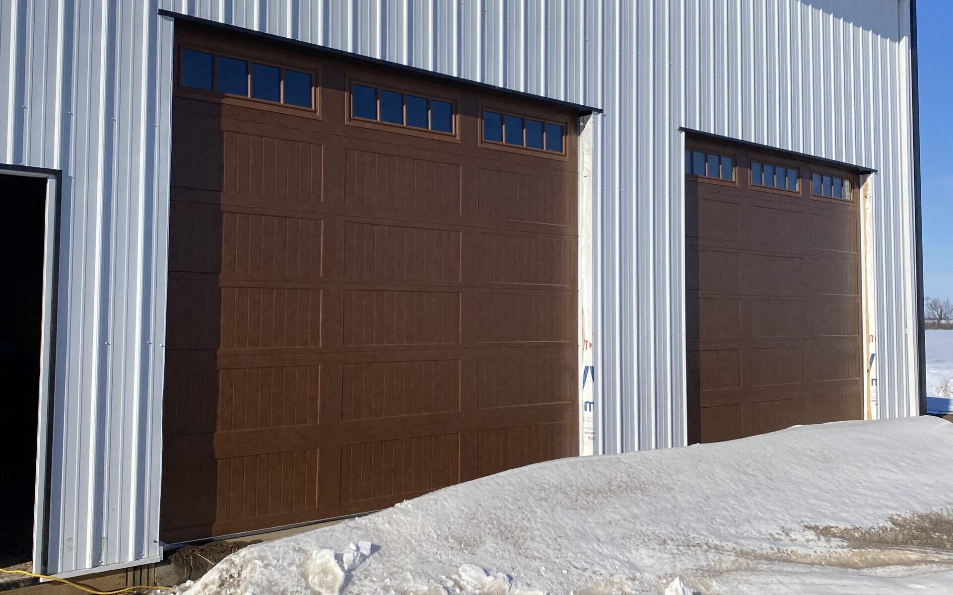 wood tone commercial garage doors